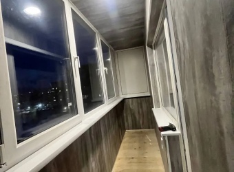 Отделка балкона ПВХ панелью + вагонка и теплое остекление